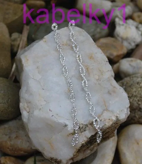 Náušnice štrasové spoločenské strieborná farba brúsené sklo