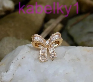 Brošňa zlatá mašlička brúsené strieborné sklo 